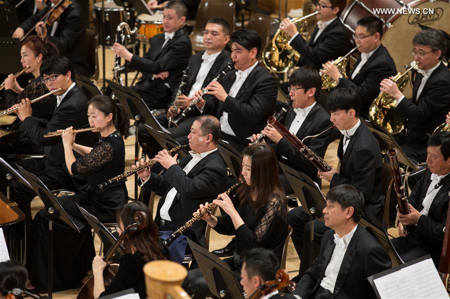 Musicians from the National Ballet of China Symphony Orchestra present featured classical music pieces from each of the permanent members of the UN Security Council in Palais des Nations in Geneva, Switzerland, Nov. 12, 2015. A joint concert on behalf of the five permanent members of the UN Security Council was held Thursday in Geneva to celebrate the 70th anniversary of the United Nations. [Xinhua]