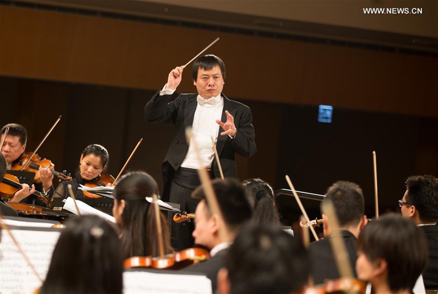 Musicians from the National Ballet of China Symphony Orchestra present featured classical music pieces from each of the permanent members of the UN Security Council in Palais des Nations in Geneva, Switzerland, Nov. 12, 2015. A joint concert on behalf of the five permanent members of the UN Security Council was held Thursday in Geneva to celebrate the 70th anniversary of the United Nations. [Xinhua]