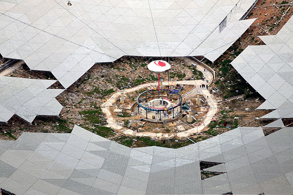 Engineers have finished two-thirds of the panels of the gigantic radio telescope in Guizhou province as of Saturday. [Photo/China Daily]