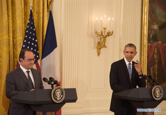 U.S. President Barack Obama(R) and French President Francois Hollande attend a press conference in Washington D.C., the United States, on Nov. 24, 2015. [Photo/Xinhua]
