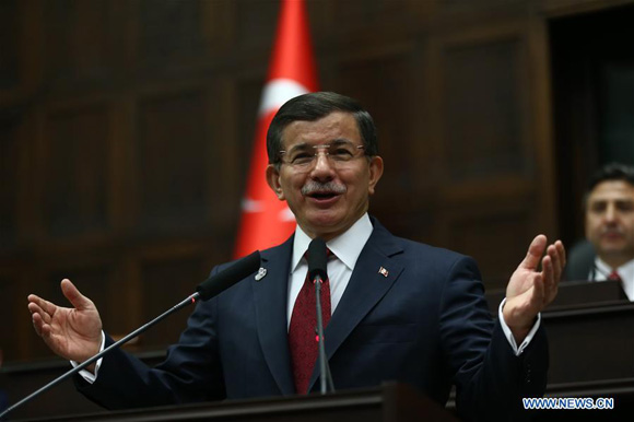 Turkish Prime Minister Ahmet Davutoglu delivers a speech at Turkish Parliament in Ankara, Turkey, on Nov. 25, 2015. Turkish Prime Minister Ahmet Davutoglu said on Wednesday that Turkey does not aim to escalate tension with Russia. [Photo/Xinhua]