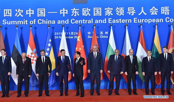 Chinese Premier Li Keqiang (C) and leaders from Central and Eastern European (CEE) countries pose for a group photo before the 4th Summit of China and CEE countries in Suzhou, east China's Jiangsu Province, Nov. 24, 2015. [Photo/Xinhua]