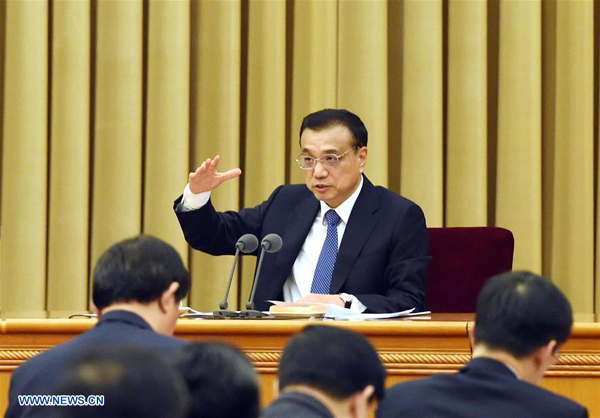 Chinese Premier Li Keqiang speaks in a meeting on poverty relief in Beijing, capital of China. [Xinhua/Rao Aimin]