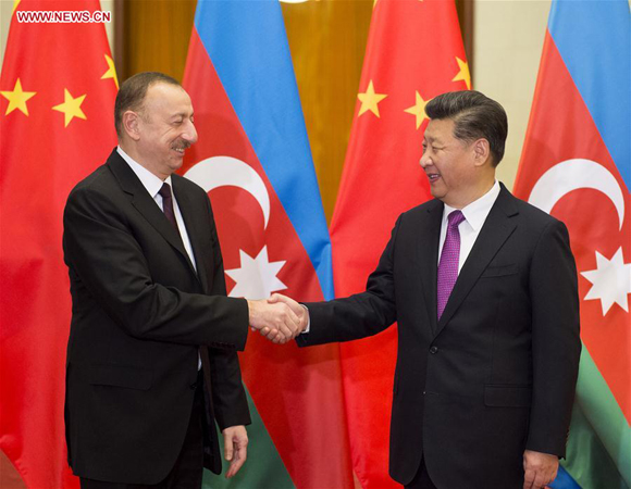 Chinese President Xi Jinping (R) holds a welcoming ceremony for Azerbaijan President Ilham Aliyev before their talks in Beijing, capital of China, Dec. 10, 2015. [Photo/Xinhua]