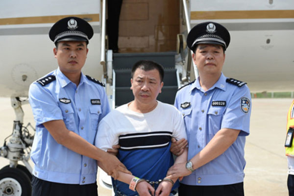 Yang Jinjun, on a list of 100 most-wanted Chinese fugitives abroad released by China in April, was repatriated from the US. [Photo/CCDI]