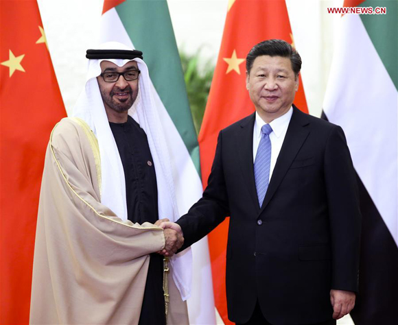 Chinese President Xi Jinping (R) meets with Sheikh Mohammed Bin Zayed Al-Nahyan, crown prince of Abu Dhabi of the United Arab Emirates, in Beijing, capital of China, Dec. 14, 2015. [Photo/Xinhua]