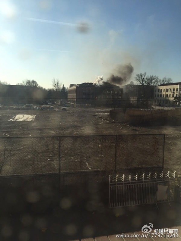 A chemical laboratory of Tsinghua University is seen on fire on Friday, caused one person died. More details remain to be confirmed. [Photo: weibo.com]