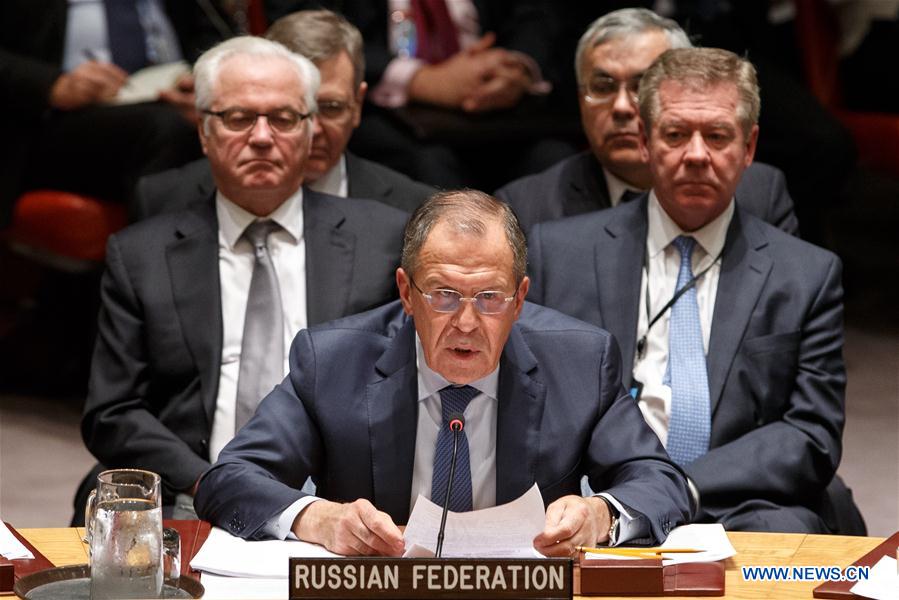 Russian Foreign Minister Sergei Lavrov (front) speaks during a United Nations Security Council meeting on Syria at the UN headquarters in New York, Dec. 18, 2015. The UN Security Council on Friday adopted a resolution endorsing an international roadmap for a Syrian-led political transition in order to end the country&apos;s conflict, which calls for Syria peace talks to begin in early January. 