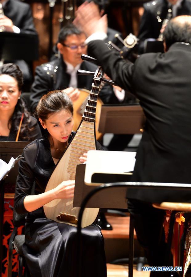 Artists from the China National Traditional Orchestra perform on a media preview at the Lincoln Center, in New York, the United States, Dec. 18, 2015. The China National Traditional Orchestra is to stage two performances of traditional Chinese music in New York. &apos;Splendor of Folk Music&apos; will be performed at Lincoln Center on Friday and the &apos;Rediscover Chinese Music&apos; at the Carnegie Hall on Sunday.