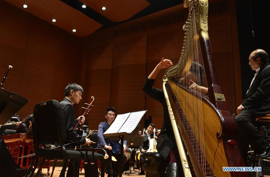 Artists from the China National Traditional Orchestra perform on a media preview at the Lincoln Center, in New York, the United States, Dec. 18, 2015. The China National Traditional Orchestra is to stage two performances of traditional Chinese music in New York. &apos;Splendor of Folk Music&apos; will be performed at Lincoln Center on Friday and the &apos;Rediscover Chinese Music&apos; at the Carnegie Hall on Sunday.