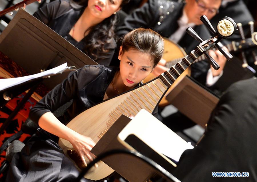 Artists from the China National Traditional Orchestra perform on a media preview at the Lincoln Center, in New York, the United States, Dec. 18, 2015. The China National Traditional Orchestra is to stage two performances of traditional Chinese music in New York. &apos;Splendor of Folk Music&apos; will be performed at Lincoln Center on Friday and the &apos;Rediscover Chinese Music&apos; at the Carnegie Hall on Sunday. 