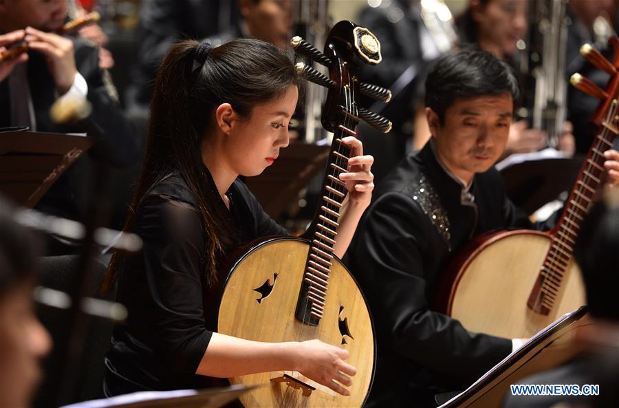 Artists from the China National Traditional Orchestra perform on a media preview at the Lincoln Center, in New York, the United States, Dec. 18, 2015. The China National Traditional Orchestra is to stage two performances of traditional Chinese music in New York. &apos;Splendor of Folk Music&apos; will be performed at Lincoln Center on Friday and the &apos;Rediscover Chinese Music&apos; at the Carnegie Hall on Sunday.