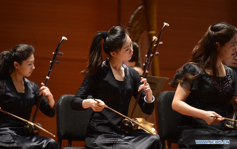 Artists from the China National Traditional Orchestra perform on a media preview at the Lincoln Center, in New York, the United States, Dec. 18, 2015. The China National Traditional Orchestra is to stage two performances of traditional Chinese music in New York. 'Splendor of Folk Music' will be performed at Lincoln Center on Friday and the 'Rediscover Chinese Music' at the Carnegie Hall on Sunday. [Photo/Xinhua]