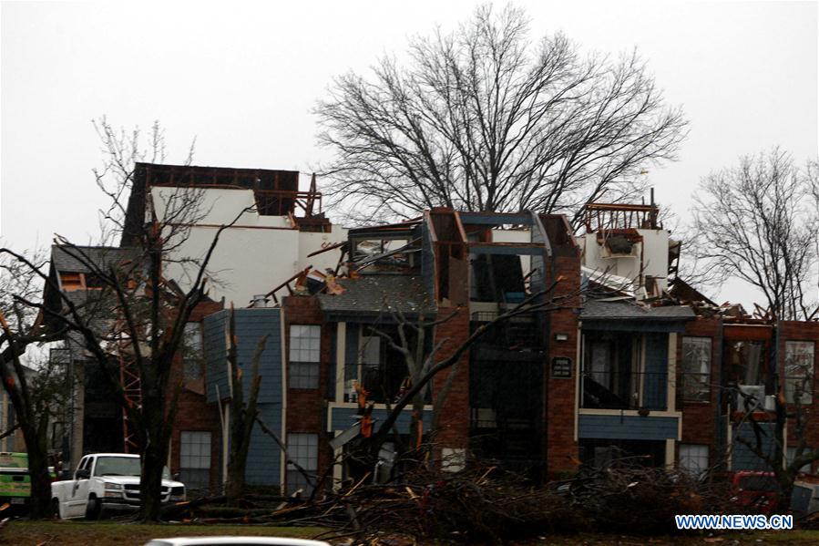 A dwelling house damaged by tornadoes is seen in Garland, Dallas, the United States on Dec. 27, 2015. Tornadoes swept through the northern part of the southern U.S. state of Texas on Saturday night, killing eleven people and causing substantial material damage. (Xinhua/Song Qiong) 