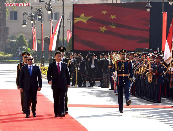 Chinese President Xi Jinping attends a grand welcome ceremony before talks with Egyptian President Abdel-Fattah al-Sisi outside the Quba Palace in Cairo, Egypt, Jan. 21, 2016. [Photo/Xinhua]