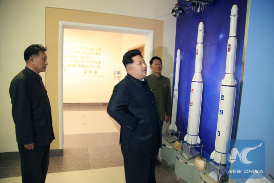 Photo provided by Korean Central News Agency (KCNA) on May 3, 2015 shows top leader of the Democratic People's Republic of Korea (DPRK) Kim Jong Un (R, front) inspecting the newly-built General Satellite Control and Command Center of the National Aerospace Development Administration (NADA) recently. [Photo/Xinhua]