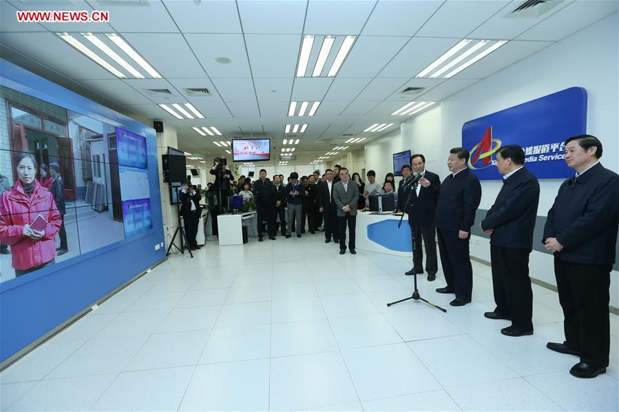 Chinese President Xi Jinping (3rd R) uses a remote news reporting command system to talk with a correspondent currently reporting from a village in Lankao County of Henan Province, at the headquarters of Xinhua News Agency in Beijing, capital of China, on Feb. 19, 2016. Xi on Friday visited the People&apos;s Daily, Xinhua News Agency and China Central Television, the nation&apos;s three leading news providers.