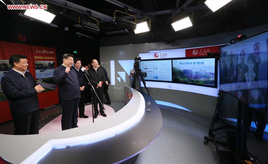 Chinese President Xi Jinping (2nd L) talks with villagers of Chixi Village in Ningde of southeast China&apos;s Fujian Province via videolink while visiting the People&apos;s Daily in Beijing, capital of China, on Feb. 19, 2016. Xi on Friday visited the People&apos;s Daily, Xinhua News Agency and China Central Television, the nation&apos;s three leading news providers.