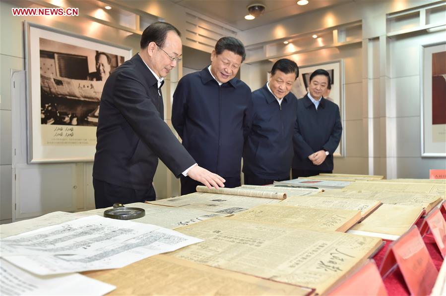Chinese PresidentXi Jinping(2nd L) is briefed on the development history of the People&apos;s Daily in Beijing, capital of China, on Feb. 19, 2016. Xi on Friday visited the People&apos;s Daily, Xinhua News Agency and China Central Television, the nation&apos;s three leading news providers. 