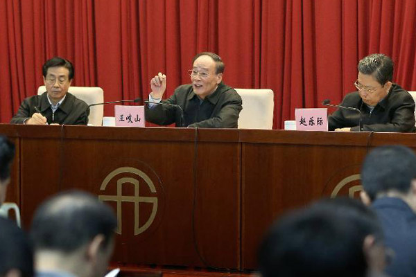 Wang Qishan (center), a member of the Standing Committee of the Political Bureau of the Communist Party of China (CPC) Central Committee and secretary of the CPC Central Commission for Discipline Inspection, addresses a conference on the work of central-level Party inspection in Beijing, China, Feb 11, 2015. [Photo/Xinhua]