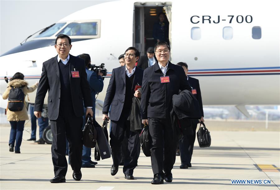 Members of the 12th National Committee of the Chinese People's Political Consultative Conference (CPPCC) from south China's Guangxi Zhuang Autonomous Region, arrive in Beijing, capital of China, March 1, 2016, for the Fourth Session of the 12th CPPCC National Committee. [Photo: Xinhua]