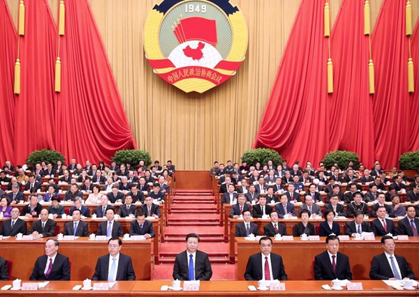 Xi Jinping (3rd L, front), Li Keqiang (3rd R, front), Zhang Dejiang (2nd L, front), Liu Yunshan (2nd R, front), Wang Qishan (1st L,front) and Zhang Gaoli (1st R, front) attend the opening meeting of the fourth session of the 12th National Committee of the Chinese People's Political Consultative Conference (CPPCC) at the Great Hall of the People in Beijing, capital of China, March 3, 2016. [Xinhua]