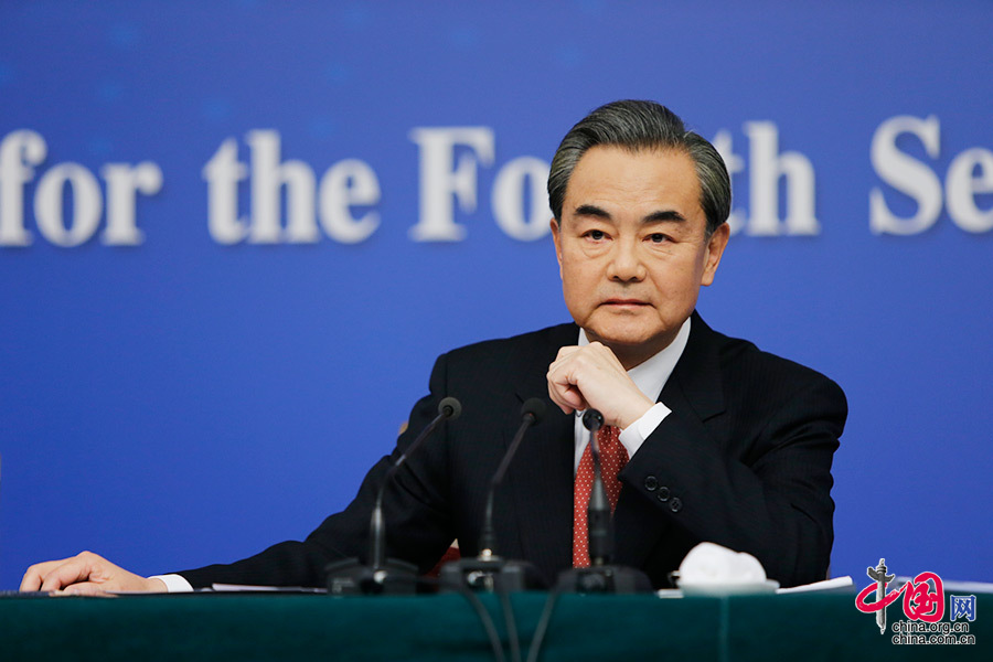 Chinese Foreign Minister Wang Yi gives a news conference on the sidelines of the ongoing session of the National People's Congress in Beijing on Tuesday, March 8, 2016. [Photo: Xinhua]