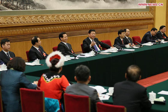 Chinese President Xi Jinping joins a group deliberation of deputies from Heilongjiang Province to the annual session of the National People's Congress in Beijing, capital of China, March 7, 2016. [Photo/Xinhua]