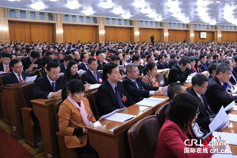 The second plenary meeting of the fourth session of the 12th National People’s Congress, China’s top legislature, is held at the Great Hall of the People in Beijing. China's top legislator Zhang Dejiang delivers a work report of the National People's Congress Standing Committee during the annual session of the national legislature on Wednesday, March 9, 2016. [Photo: CRI Online]