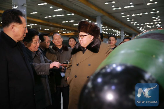 Photo provided by Korean Central News Agency (KCNA) on March 9, 2016 shows top leader of the Democratic People's Republic of Korea (DPRK) Kim Jong Un recently meeting with the scientists and technicians in the field of nuclear weapons and guiding the work for boosting the nuclear arsenal. [Photo/Xinhua]