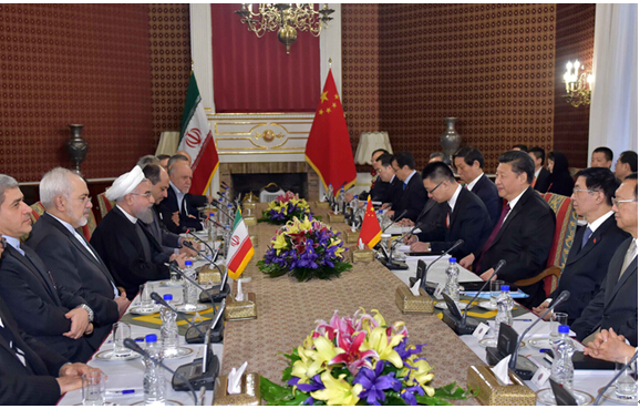 Chinese President Xi Jinping (3rd R) holds talks with Iranian President Hassan Rouhani(3rd L) in Tehran, Iran, Jan. 23.