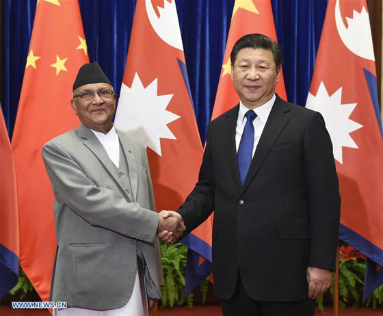 Chinese President Xi Jinping (R) meets with Nepali Prime Minister K. P. Sharma Oli at the Great Hall of the People in Beijing, capital of China, on March 21, 2016. [Photo/Xinhua]