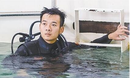 Guan Dong during a diving exercise. [File photo] 