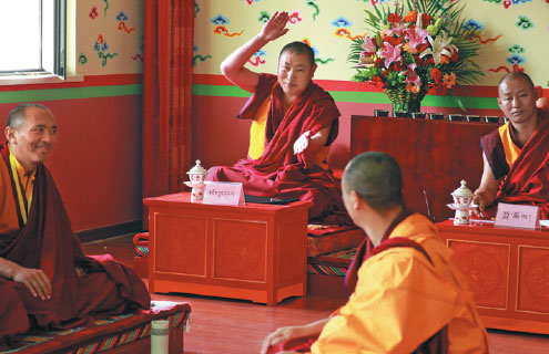 Monks at the High-level Tibetan Buddhism College of China debate the scriptures. Provided to China Daily