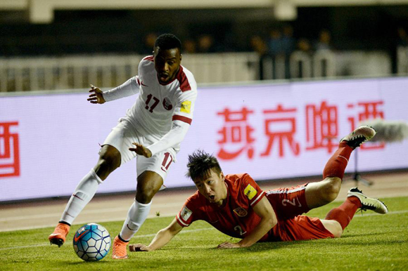 China's soccer team looked promising to continue their dreams of 2018 World Cup after a 2-0 comfortable win over Qatar in a crucial Asian Zone Group C qualifier in Xi'an on Tuesday.