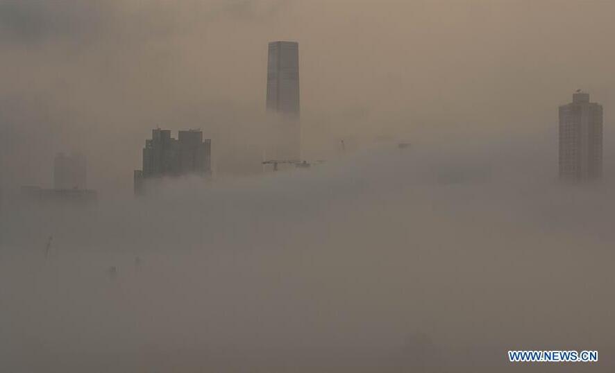 The city landscape is seen engulfed in heavy fog in Hong Kong, south China, April 6, 2016. (Xinhua/Lui Siu Wai)
