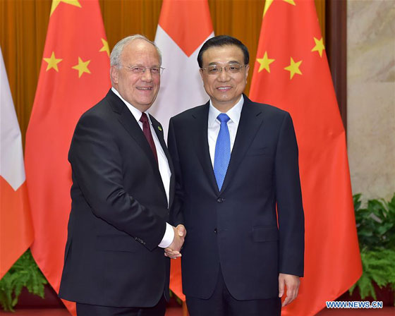 Chinese Premier Li Keqiang meets with Swiss President Johann Schneider-Ammann in Beijing, China, April 7, 2016. [Photo/Xinhua]