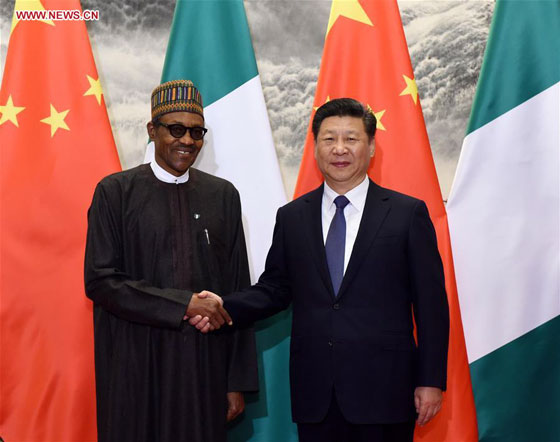 Chinese President Xi Jinping(R) holds talks with Nigerian President Muhammadu Buhari in Beijing, capital of China, April 12, 2016. [Photo/Xinhua]