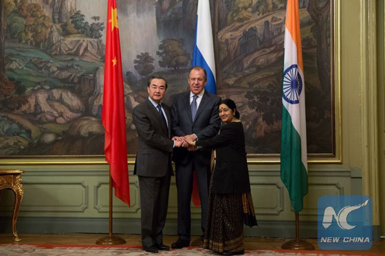 Chinese Foreign Minister Wang Yi (L), Russian Foreign Minister Sergey Lavrov (C) and Indian External Affairs Minister Sushma Swaraj attend the 14th Meeting of the Foreign Ministers of China, Russia and India, in Moscow, capital of Russia, on April 18, 2016. [Photo/Xinhua]