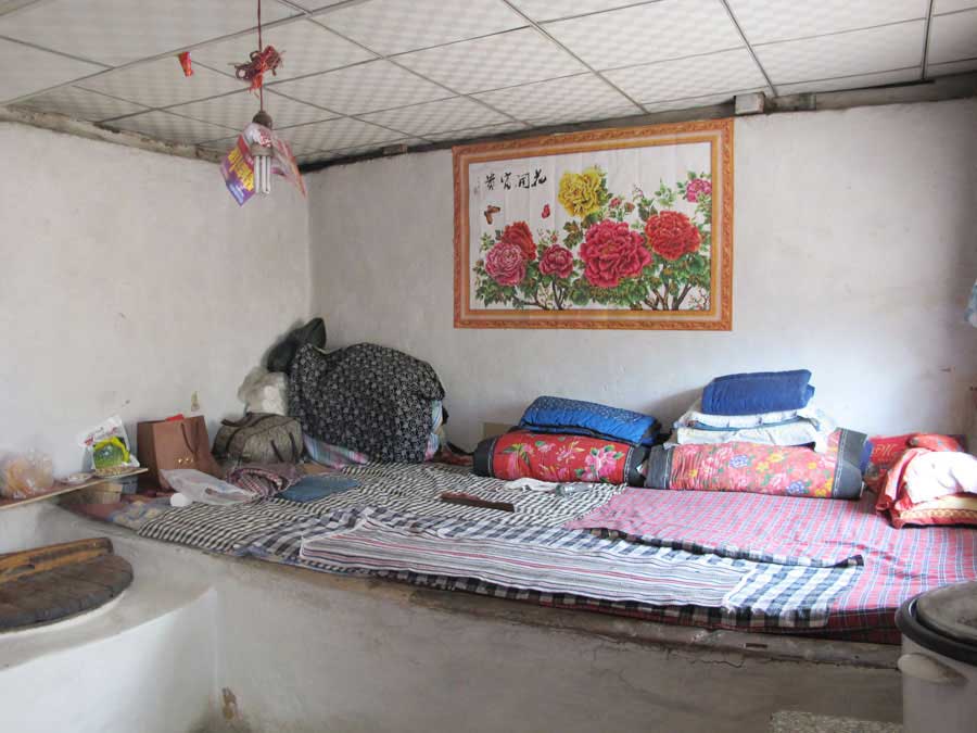 A view of the inside of Tang Ronglai's house. [Photo by Wu Yan/chinadaily.com.cn] 