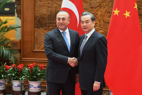 Chinese Foreign Minister Wang Yi meets with his Turkish counterpart Mevlut Cavusoglu in Beijing on Monday. [Photo/www.fmprc.gov.cn] 