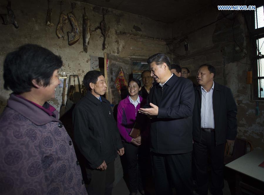 Chinese President Xi Jinping visits the family of villager Chen Zeping in Dawan Village of Huashi Township in Jinzhai County, Liuan City, east China&apos;s Anhui Province, April 24, 2016. Xi made an inspection tour in Anhui from April 24 to 27. (Xinhua/Li Xueren) 