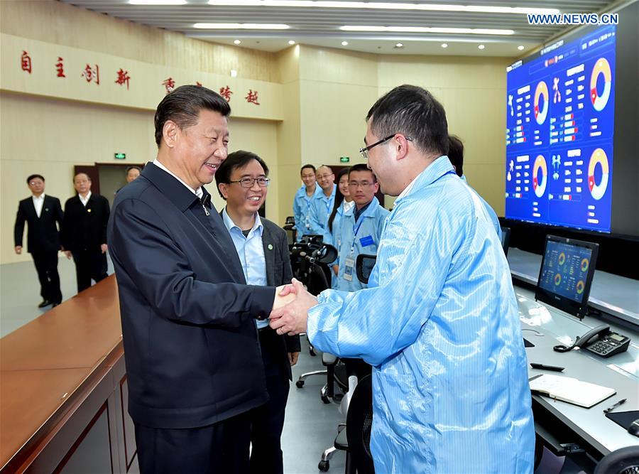Chinese President Xi Jinping visits the Spin Magnetic Resonance Laboratory at University of Science and Technology of China in Hefei, east China&apos;s Anhui Province, April 26, 2016. Xi made an inspection tour in Anhui from April 24 to 27. (Xinhua/Li Xueren) 
