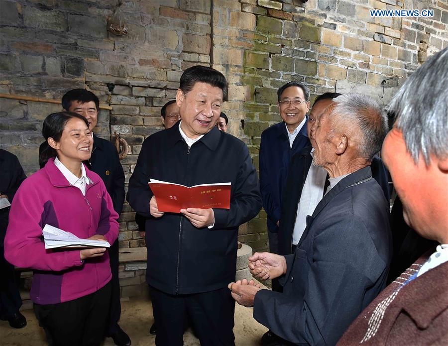 Chinese President Xi Jinping visits the family of villager Wang Nengbao at Dawan Village of Huashi Township in Jinzhai County, Liuan City, east China&apos;s Anhui Province, April 24, 2016. Xi made an inspection tour in Anhui from April 24 to 27. (Xinhua/Li Tao) 