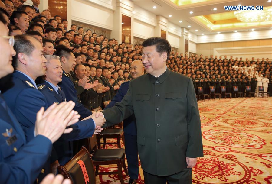 Chinese President Xi Jinping shakes hands with senior military officers stationed in Anhui, in Hefei, capital of east China&apos;s Anhui Province, April 26, 2016. Xi made an inspection tour in Anhui from April 24 to 27. (Xinhua/Li Gang) 