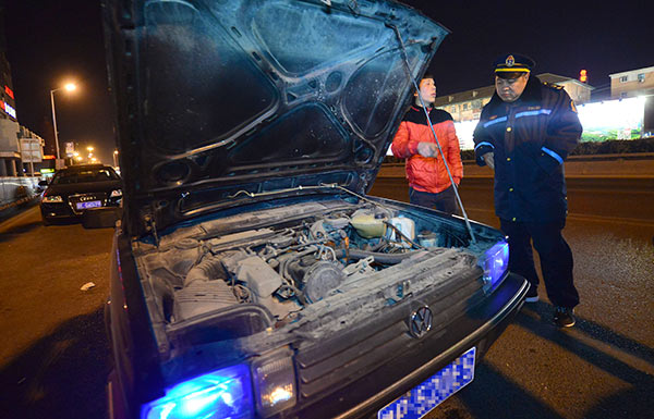 A private car is seized by transport authorities in February because its driver offered rides for payment and failed to provide the required licenses in Beijing.[Guo Qian/For China Daily]