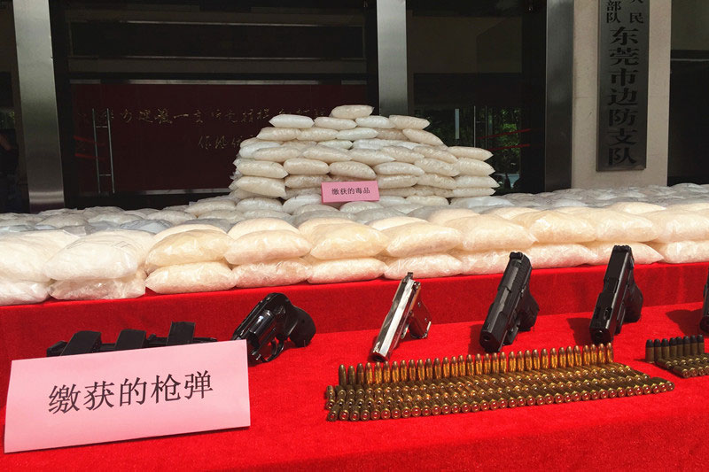 Photo taken on May 5, 2016 shows confiscated articles involved in a major drug smuggling case at the border detachment of Dongguan, south China's Guangdong Province. [Photo: CRI Online]