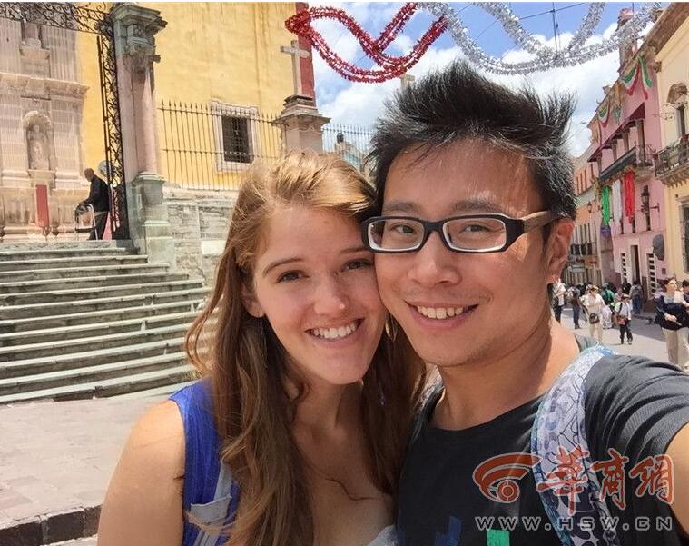 He Jianghai takes a picture with his girlfriend Ciara Metzoian. [hsw.cn] 