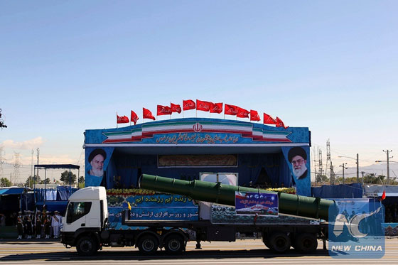 An Iranian military truck carries parts of the S200 missile system during the Army Day parade in Tehran on April 17, 2015. [Photo/Xinhua]