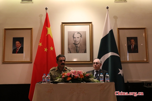 Pakistan's military spokesperson Lieutenant General Asim Saleem Bajwa (L) and Ambassador of Pakistan to China Masood Khalid (R) at a press conference in Beijing on May 17, 2016. [Photo by Gong Jie/China.org.cn]